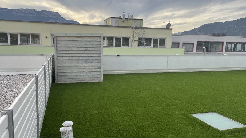 Artificial lawn on rooftop terrace in Bolzano
