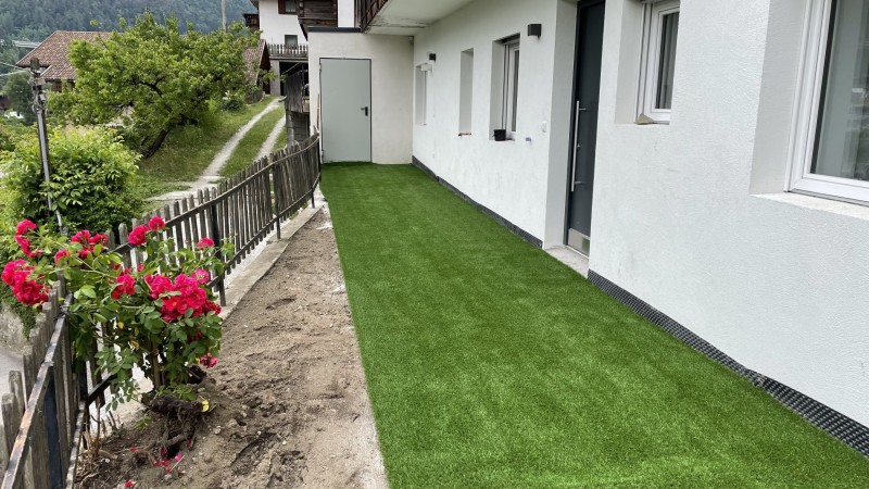 Artificial lawn on terrace in Chiusa