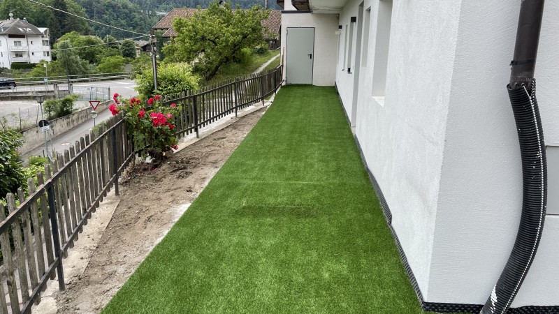 Artificial lawn on terrace in Chiusa