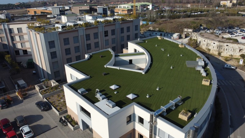 Artificial lawn on rooftop terrace Pederzoli Health Clinic Peschiera Lake Garda