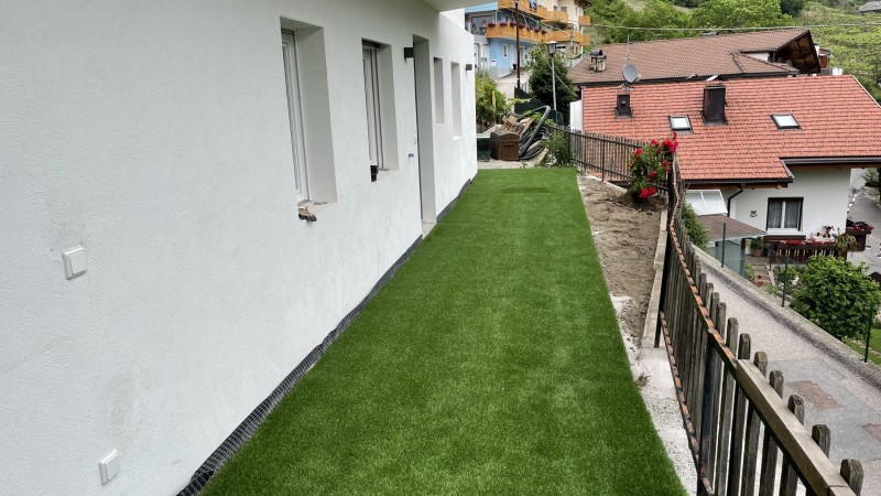 Artificial lawn on terrace in Chiusa