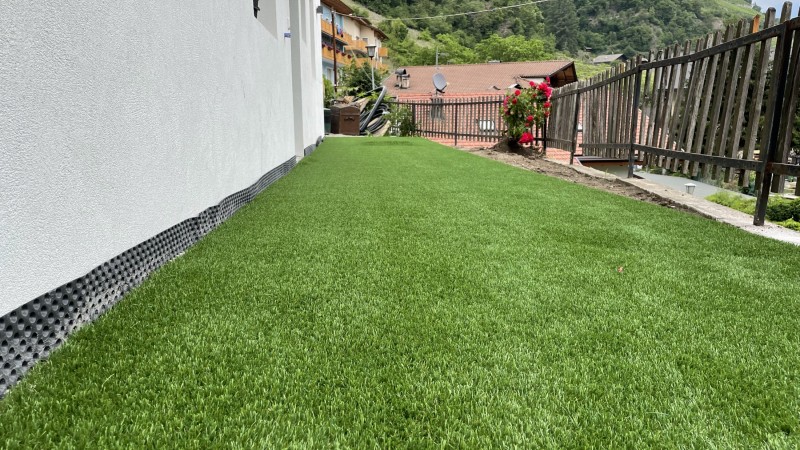 Artificial lawn on terrace in Chiusa